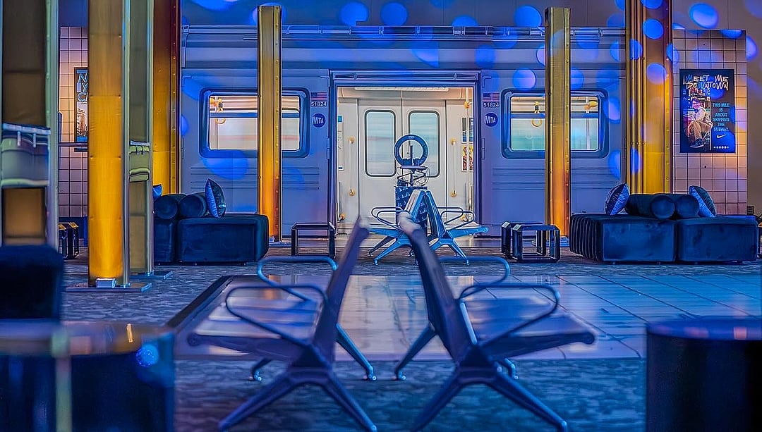 Travel-themed lounge with airport-style seating