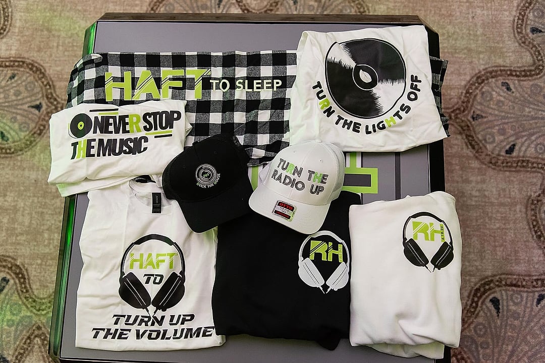 Custom pajamas, hats and t-shirts arranged as favors